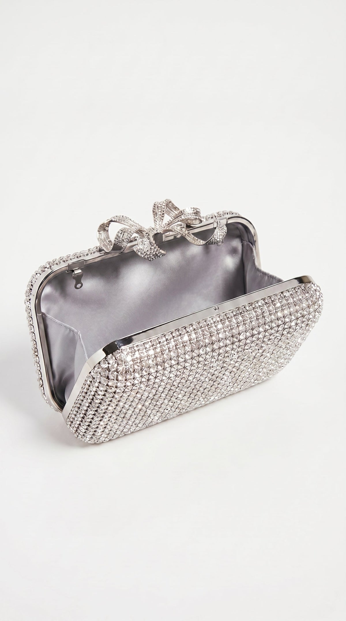 CLUTCH DE LAZO CON CRISTALES PLATEADO