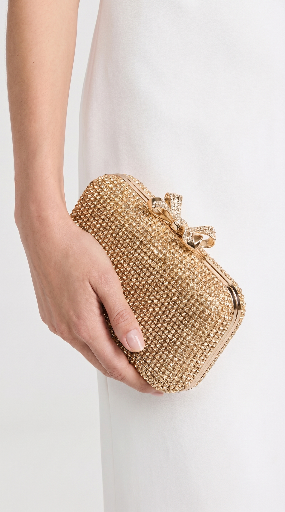 CLUTCH DE LAZO CON CRISTALES DORADO